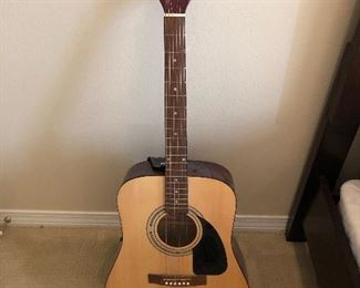 Very nice Fender acoustic guitar and case.
