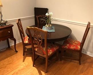 Pretty 48” round table. Has a 24” leaf. 
