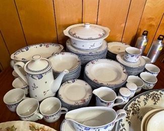 Set of dishes with serving pieces