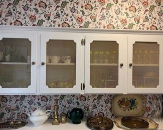 Cabinets are full of glassware and more