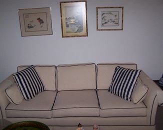ONE OF A PAIR OF SOFAS & PRINTS