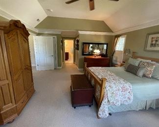 Vintage oak armoire with three adjustable shelves, two drawers in base, comes apart for moving, great for TV, electronic components, clothing, books, etc.  New England red antique painted blanket chest, vintage double cherry dresser (matches tall boy chest), newer black wall mirror (bed, NFS).