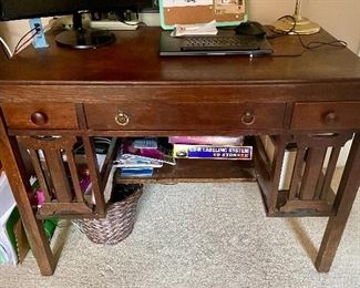 Mission oak desk with 3 drawers & open side shelves.