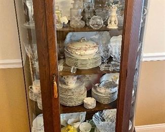 SOLD - Antique c 1900 oak china cabinet with curved glass, Queen Anne style. All contents available: G&D and Haviland Limoges service for 10+ serving pieces, stemware, soft paste sprigware dishes, cut glass, decanters, EAPG, etc.