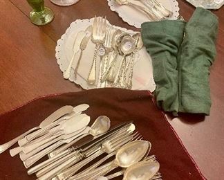 Silverplated flatware (1 set sold, 1 set available) & hollowware, crystal knife rests, antique etched glass spooner. depression glass vase.