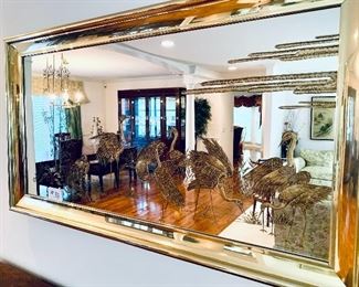 #38- Vintage brass bird mirror. 
54”w. 30”t. $325