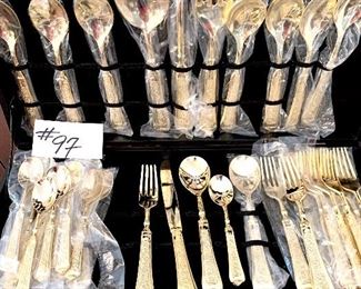 Gold toned flatware. 51 pieces. 
12 piece place setting. $400