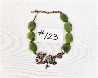 Heidi Daus necklace- Dragon with simulated Jade stones. 6-8”. $200