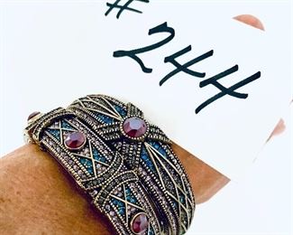 Pair of Heidi Daus bracelets. $68
Blue/purple 