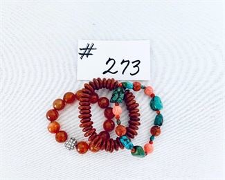 3 bracelets.  Turquoise and coral looking. 
$28