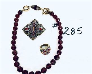 Dark purple necklace 8-9” , ring and  pin 
Heidi Daus.  Ring size 8.    $85