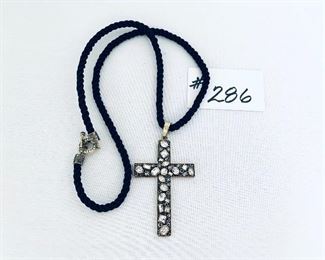 Heidi Daus. Necklace and cross.
 17-21”. $56
