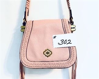 Pink oryany handbag. Slight wear on the strap. 8.5 w. 8t.   $50