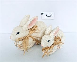 Pair of resin rabbits. 8-10” L. $20