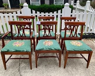 6 antique needlepoint chairs. See photos for imperfections. $240