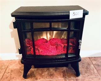 Remote controlled electric fireplace. 
It works!! 21 w 11.5 d. 24 t.  $160