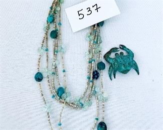 Turquoise color necklace sterling clasp       9- 12”   Metal crab pin. $45