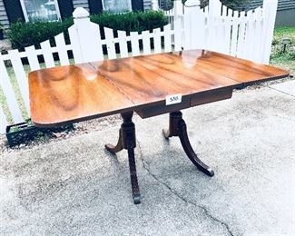 Antique drop leaf table. 62L. 40w. 30 t. 
Minor scratches. $250