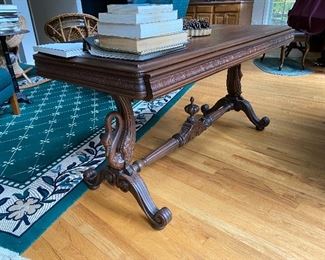 1920s-30s walnut library table with scroll feet and swan base. $450
