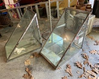 Pair of counter top showcases with shelves.