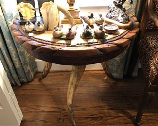 Western half moon table with long horns and cowhide