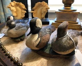 Meticulously carved wooden ducks and mallards