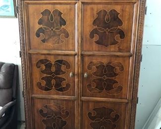 quality lovely multi functional armoire wardrobe entertainment center.