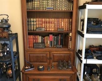 French Walnut pulled front secretary desk and large collection of leather bound gilt gold books