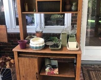 Unique desk/storage unit with gardening/potting supplies
