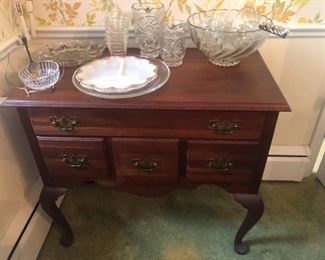 Dining side table with antique punch serving set and dishes
