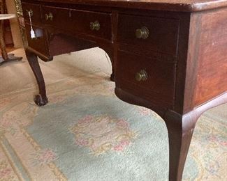 Chippendale style flat-top desk with original pulls - late 19th or early 20th C.  Mahogany