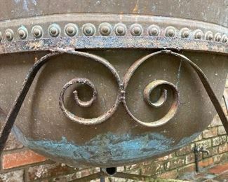 Base of one of the sugar cane pots used as planters