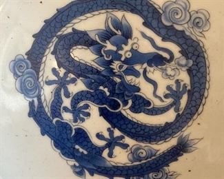 Detail of one of a pair of old Asian plates
