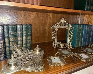 Antique inkwell, frames, books