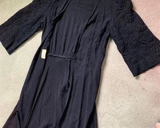 Mid- century hostess robe- fabulous trapunto sleeves. 