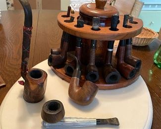 More pipes, and another pipe holder, this one also has a jar for I'm assuming pipe accessories.  Do pipes have accessories?  I assumed it was for tobacco but I was informed that was not the case so you know for all your pipe accessory needs.