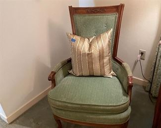This chair is Drexel and upholstered in a great teal color.  Also great retro touch is the karate chopped pillow.