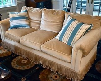 Velvet sofa with fringe