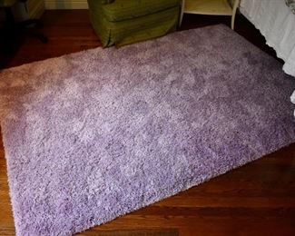 Purple shag rug. Approx. 7'6" x 5'4"