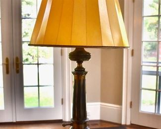 One of a pair of antiqued brass lamps