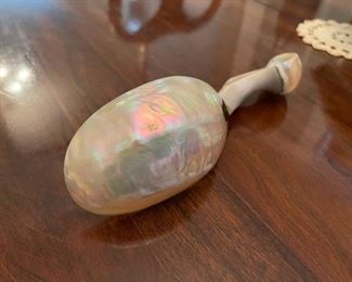 Antique conch shell serving spoon