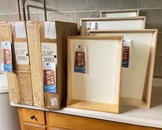 Several pull-out shelves by The Pull-Out Shelf Company of the Twin Cities.  Sizes vary