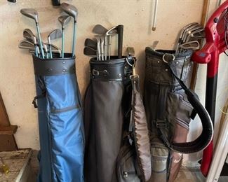 Golf club sets.  There are also several individual golf clubs for both left and right hand