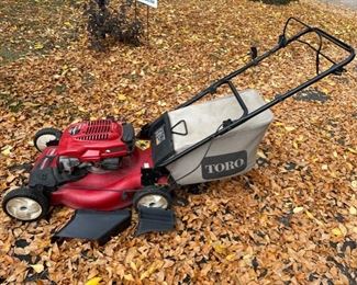 Toro self-propelled lawn mower with bagger