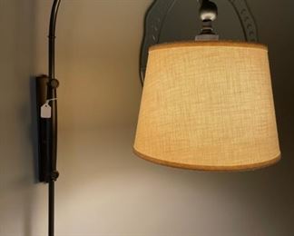 Detail of Pottery Barn adjustable height swivel wall lamps
