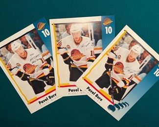 Three larger photo cards of Pavel Bure, autographed