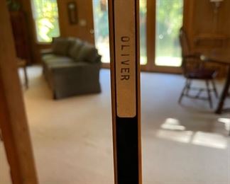 Vintage Northland hockey sticks, including one signed by staff and players as a retirement gift