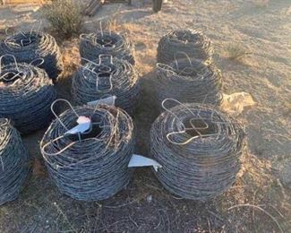 #408 • 12 Rolls Of Barbed Wire: 11 New Rolls 1 Partially Used. 12.5 Gauge 4Pt- 5” Spacing, 