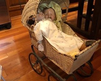 Doll buggy and antique dolls