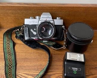 Minolta Came with lens and flash attachments